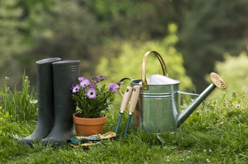 Team of gardeners preparing equipment with insurance paperwork
